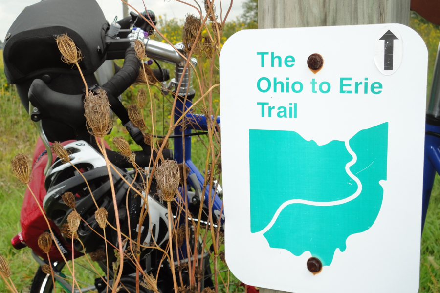Ohio to Erie Trail sign and bike weeds